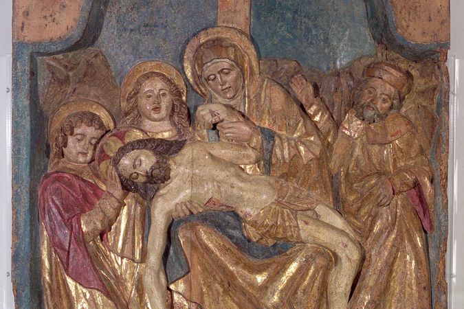 Hochrelief, das die Klage über den toten Christus darstellt