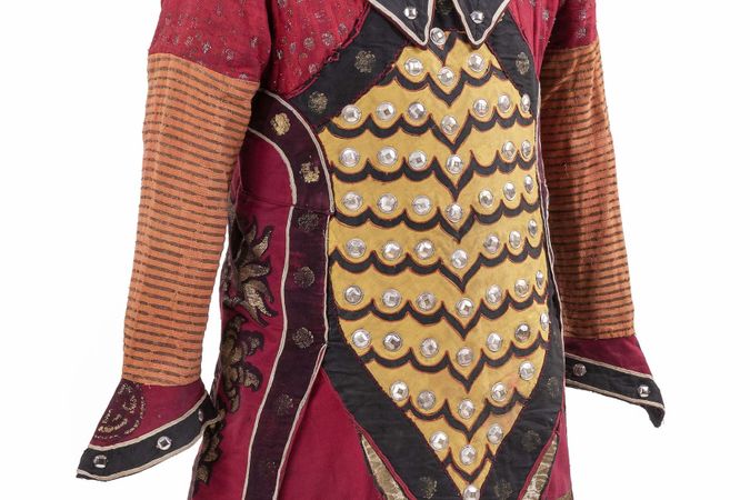 Theatrical costume. Male suit consisting of tunic and hood