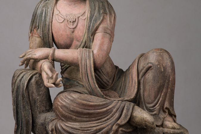 Bodhisattva Guanyin couché dans mahārājalīlāsana