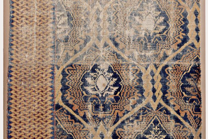 Fragment d'un tapis avec un motif textile