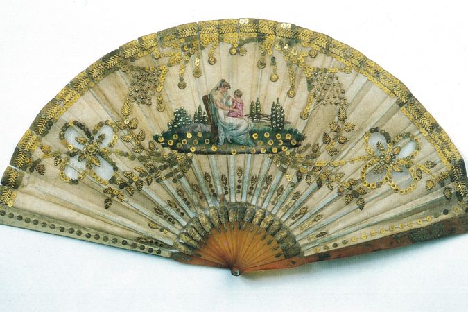 Fan with decorations
