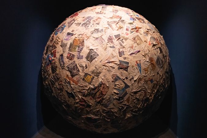 Large sphere of newspapers