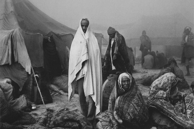 Am frühen Morgen beim religiösen Fest Kumbh Mela