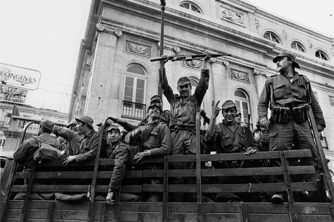 Soldiers celebrating greet the crowd, Lisbon.