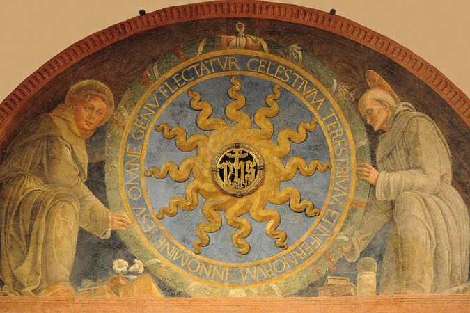 Sant'Antonio y San Bernardino apoyan el monograma de Cristo