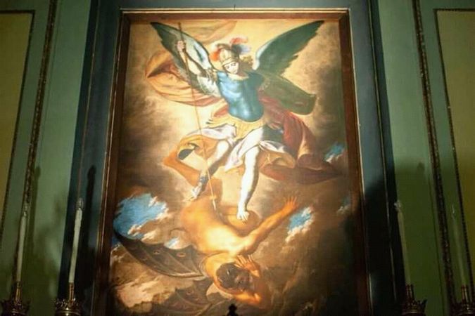 Archangel Michael who overthrows the devil