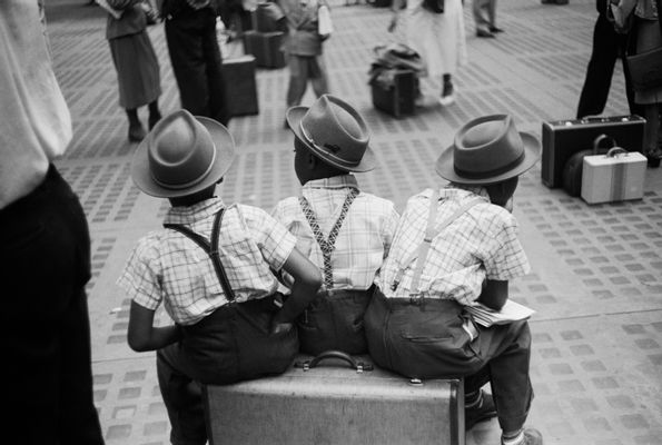 Penn Station, boys on suitcase