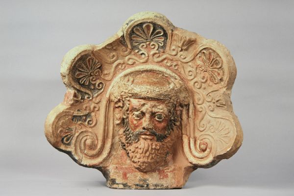 Terracota arquitectónica (antefix) con la cabeza de un silenus del templo del belvedere