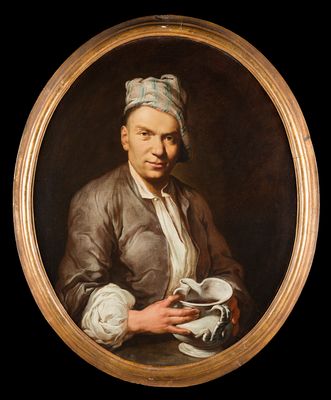 Portrait of a man with a mug