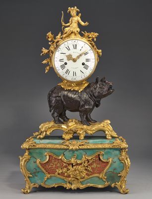 Clock with rhinoceros as carrier