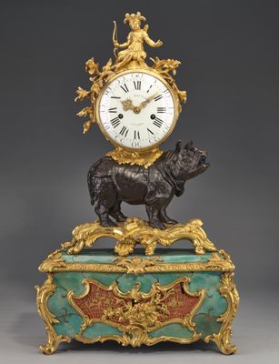 Horloge avec rhinocéros comme porteur