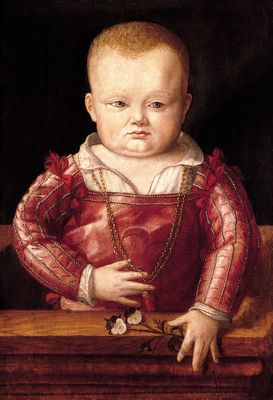 Retrato de un niño llevando túnica roja y cadena de oro