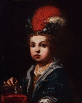 Portrait d'un garçon avec un chapeau à plumes