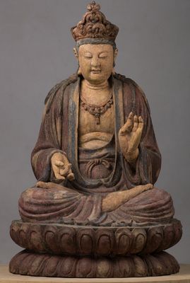 Bodhisattva sitzt im umgekehrten Vitarkamudrā