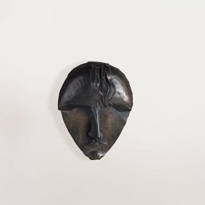 small mask with tuft