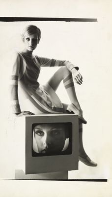 Twiggy wearing a mod minidress by Louis Féraud and leather shoes by François Villon