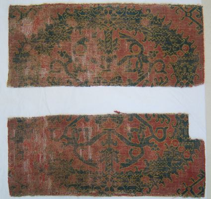 Two fragments of a garland carpet