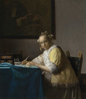 Woman writing in yellow