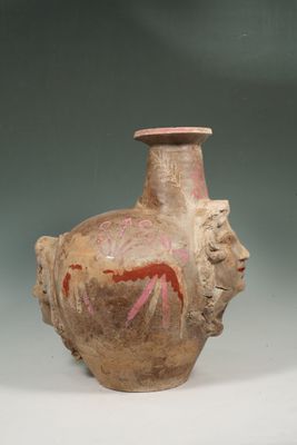 Polychrome askos depicting female faces