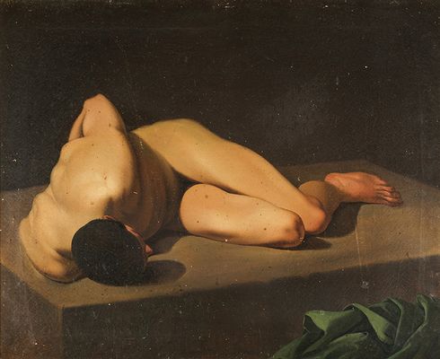 hombre desnudo en el suelo