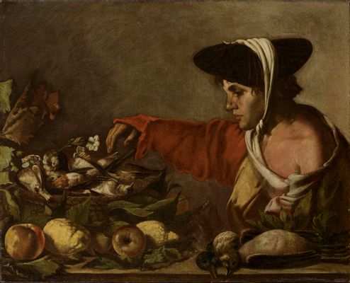 Boy with fruit and basket of game