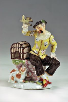 Harlequin plays with a bird and a cat