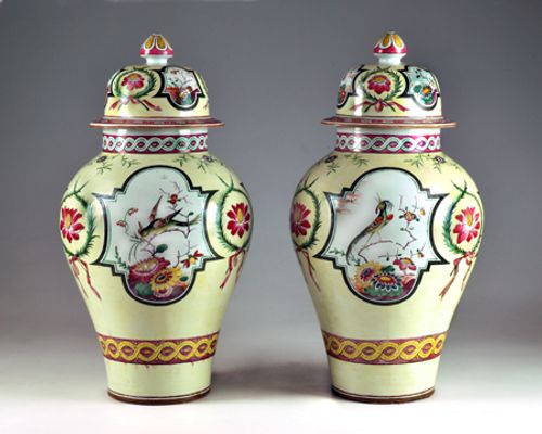 Two potiche jars with lids