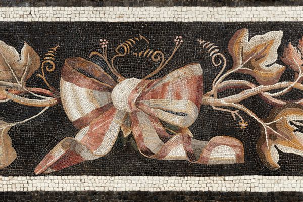 Mosaic with bow and vine shoots