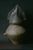 Urna bicónica con casco con cresta